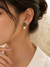 Emerald Bloom Pearl Earrings